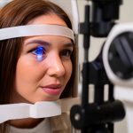 Retinal specialist conducting eye examination for retinal disorders in Dubai