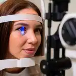 Retinal specialist conducting eye examination for retinal disorders in Dubai